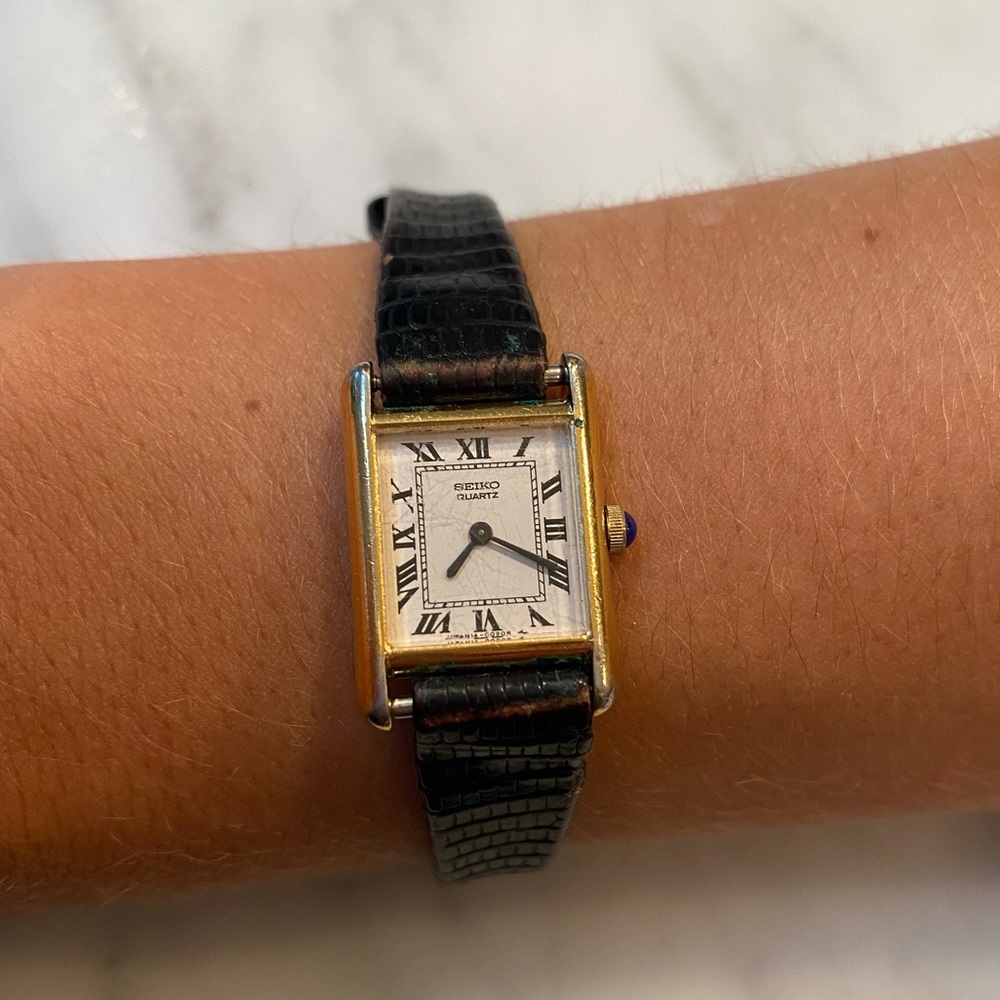 Seiko Quartz ladies’ rectangular face watch with gold trim